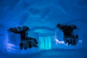 Ice chairs with reindeer skin covers at ice domes in Arctic Norway