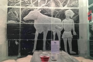 Reindeer and Sami ice wall sculpture in Magic Ice Bar Tromsø