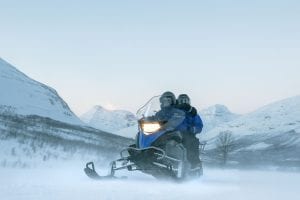 Snowmobiling Safari in Tromso Norway with snow and fjords
