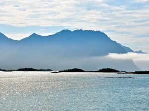 Hamn i Senja Sea Beach with fjords and clouds